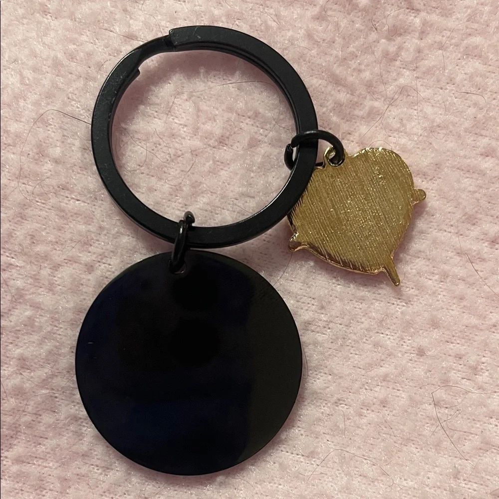 Source Unknown keychain red